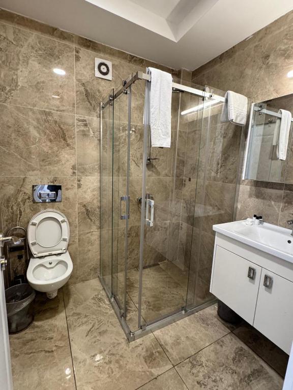Koupelna v ubytování elisa hotel