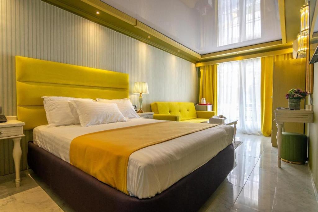 Postel nebo postele na pokoji v ubytování Hotel Craiova Olimp by Phoenicia