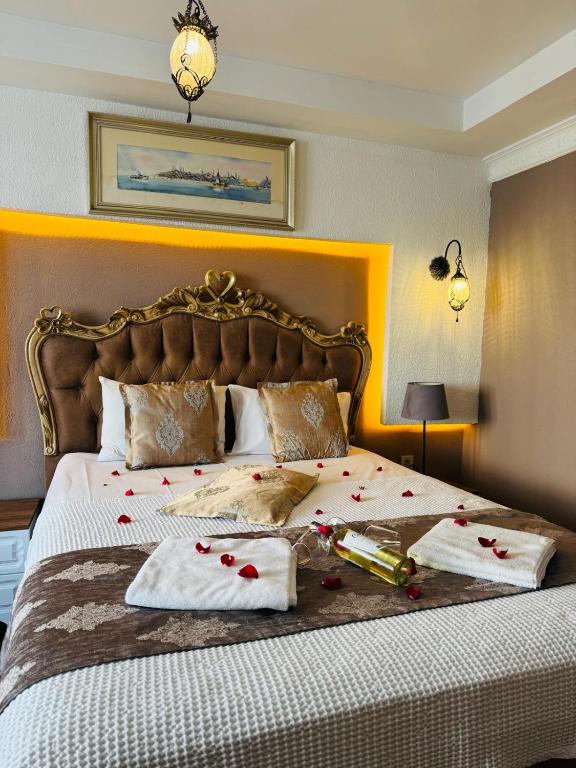 Postel nebo postele na pokoji v ubytování elisa hotel