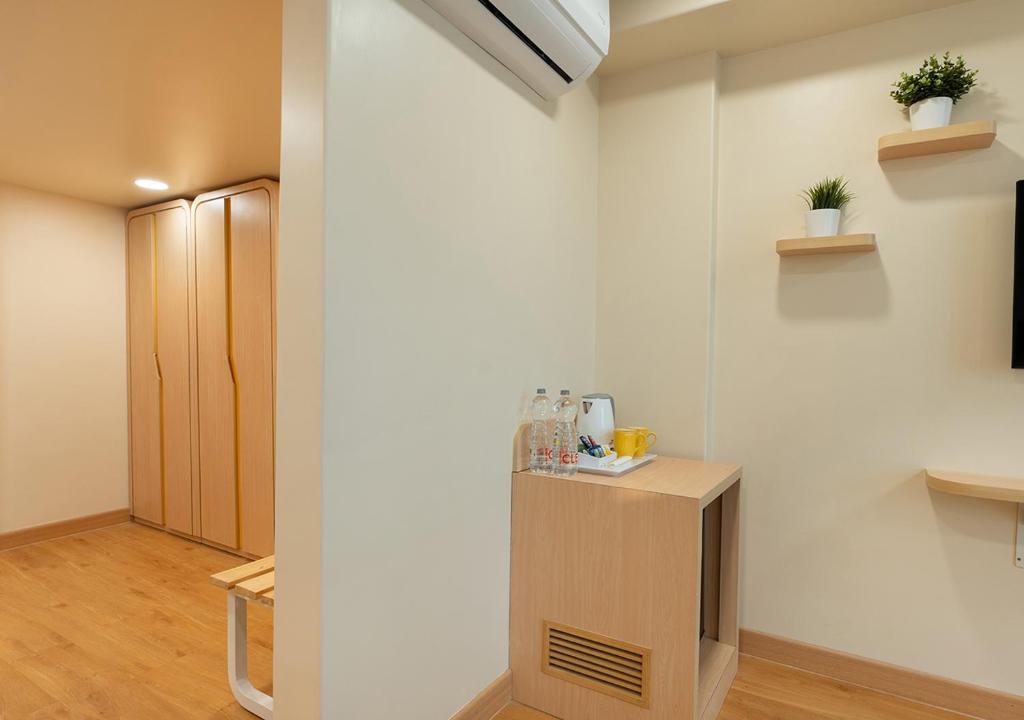 TV a/nebo společenská místnost v ubytování Bloom Hotel SG Highway