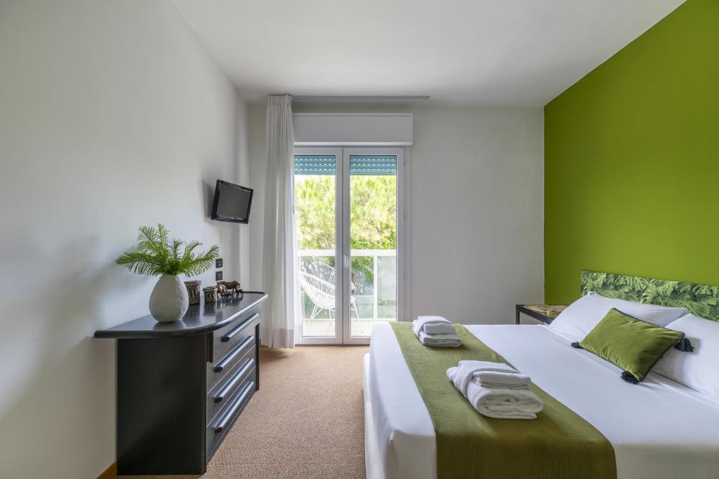 TV a/nebo společenská místnost v ubytování Harvey Suites Hotel & Residence