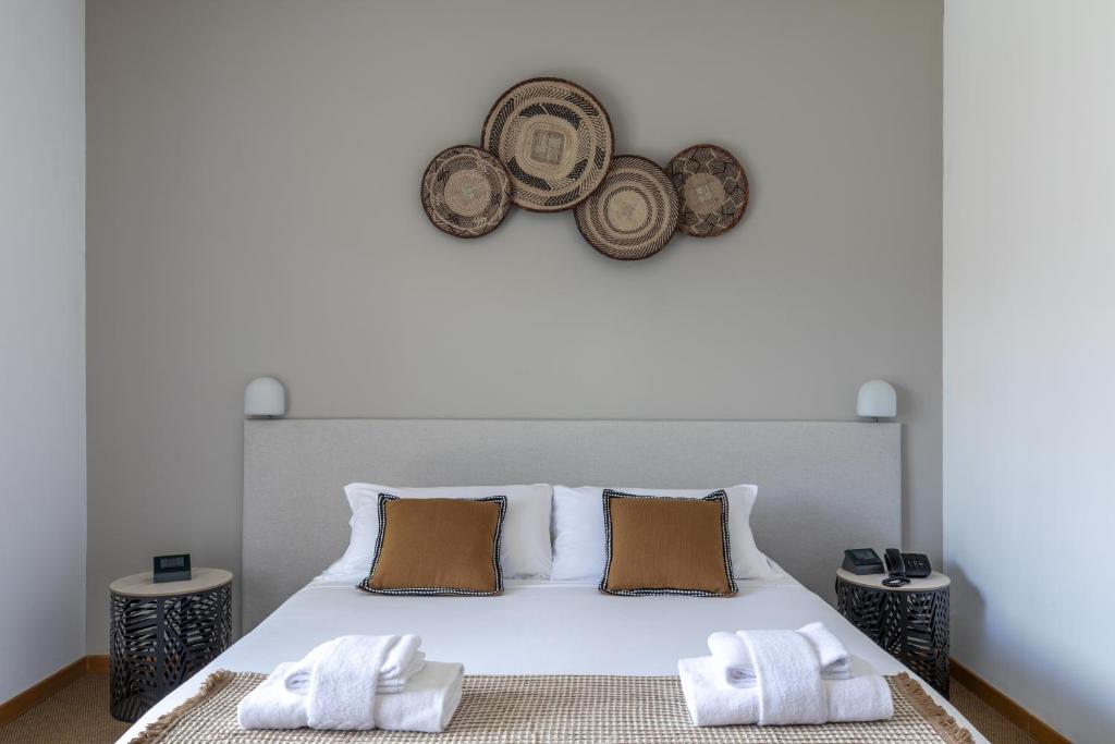 Postel nebo postele na pokoji v ubytování Harvey Suites Hotel & Residence
