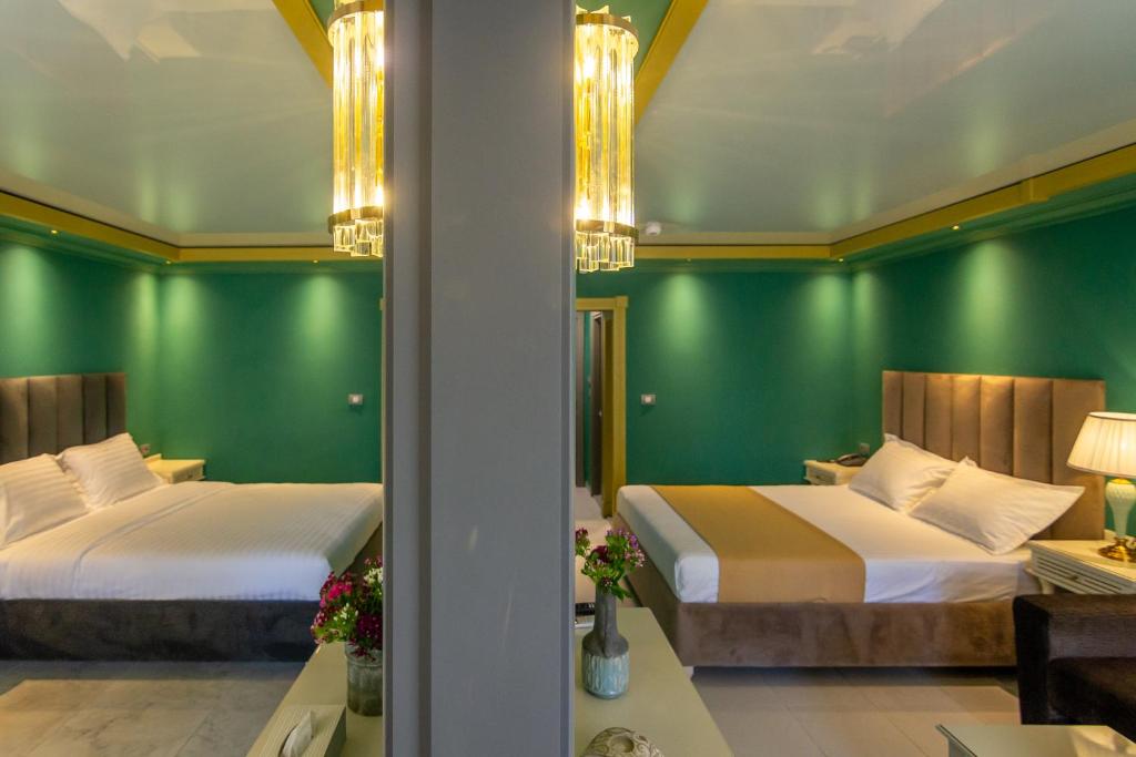 Postel nebo postele na pokoji v ubytování Hotel Craiova Olimp by Phoenicia