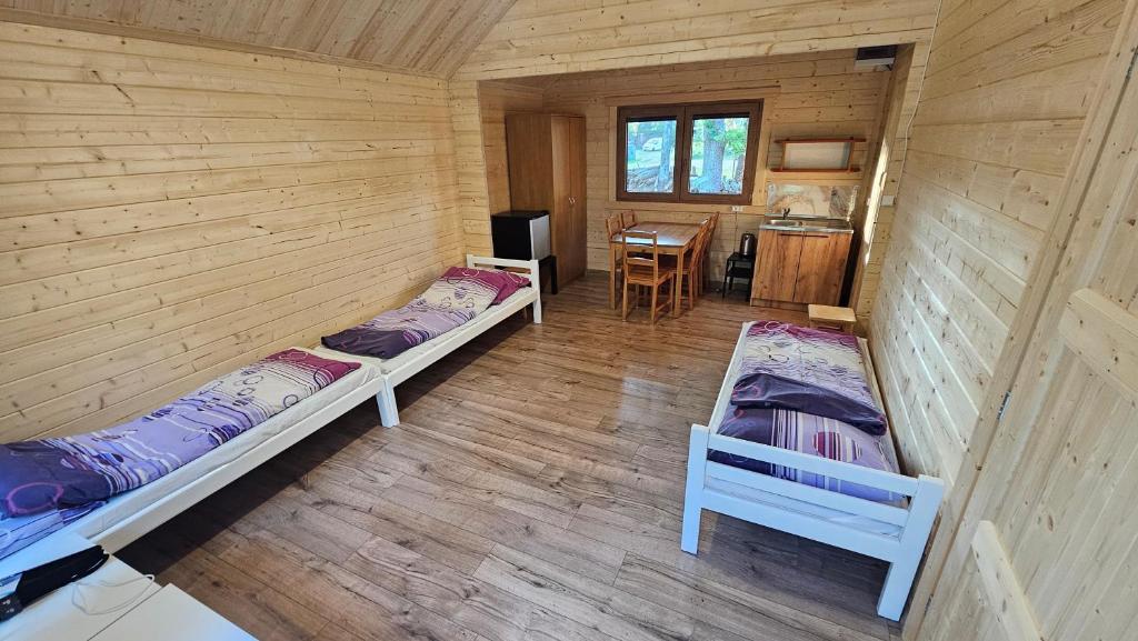 Posteľ alebo postele v izbe v ubytovaní Ośrodek BEATA / FIORD