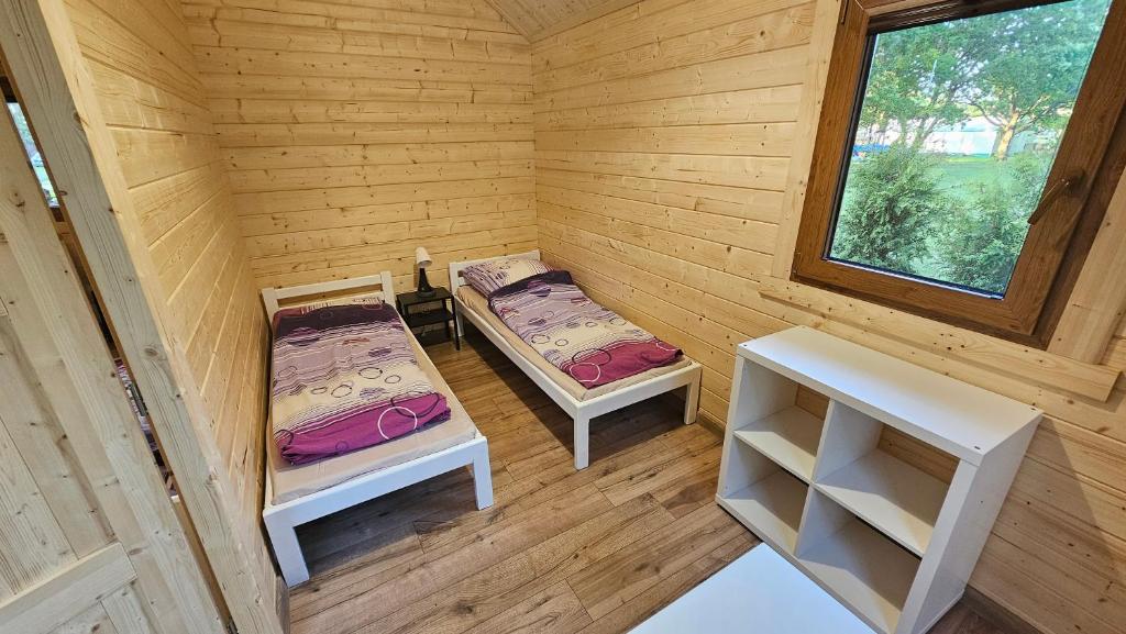 Posteľ alebo postele v izbe v ubytovaní Ośrodek BEATA / FIORD