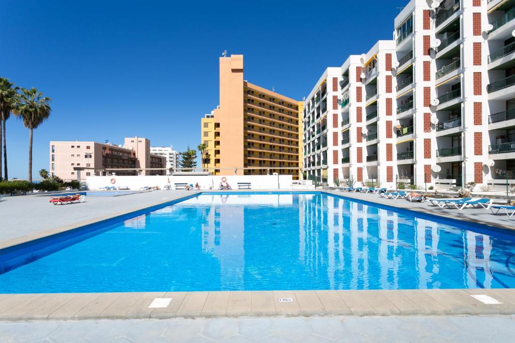 The swimming pool at or close to Cosy apartment near the sea in Las Americas