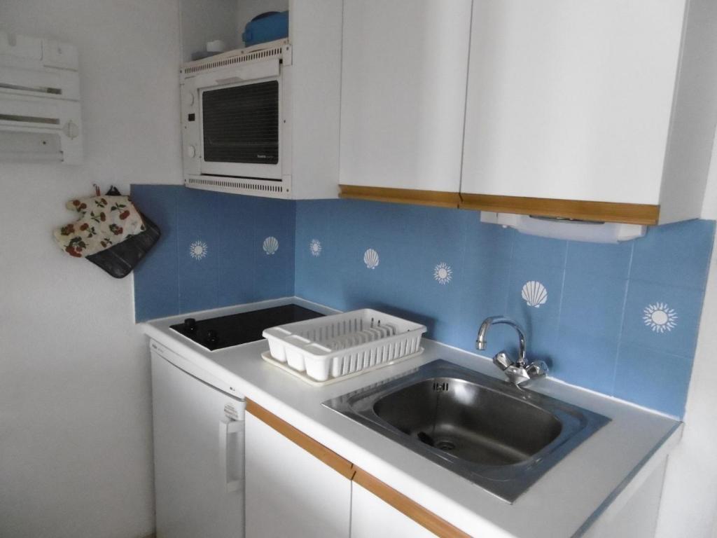 Kuchnia lub aneks kuchenny w obiekcie Appartement 5 pers avec loggia, parking privé à Sète - FR-1-472-166
