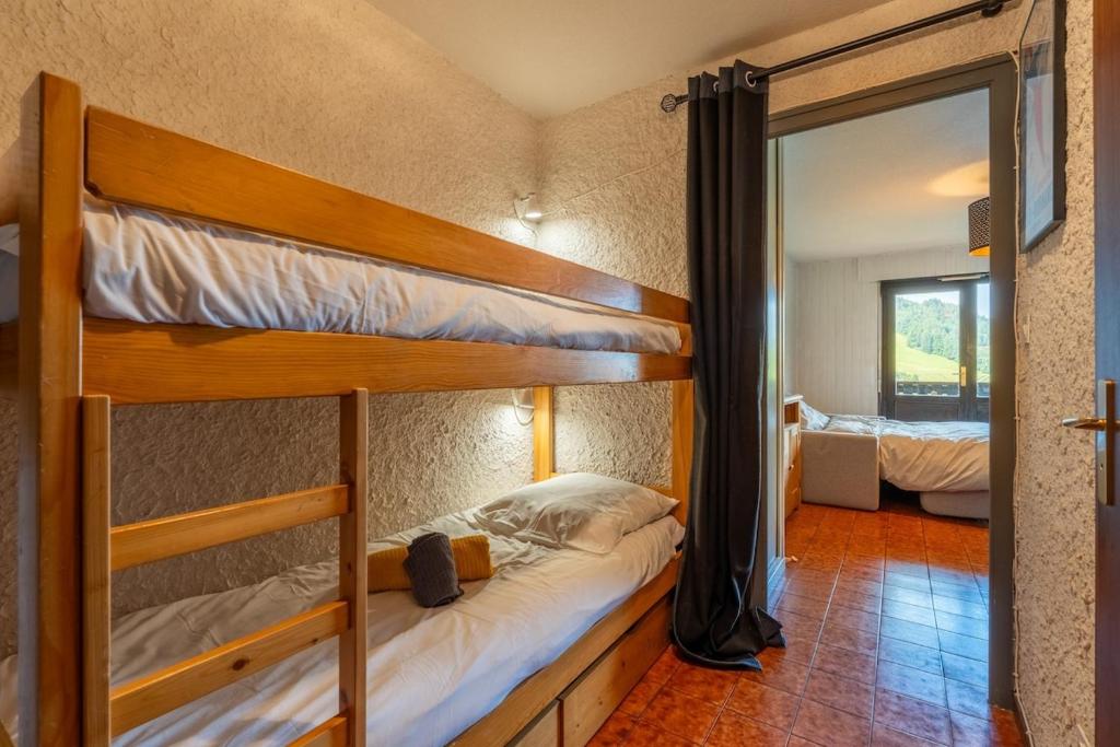 Postel nebo postele na pokoji v ubytování Studio au pied des pistes Vue imprenable Grand Bo'