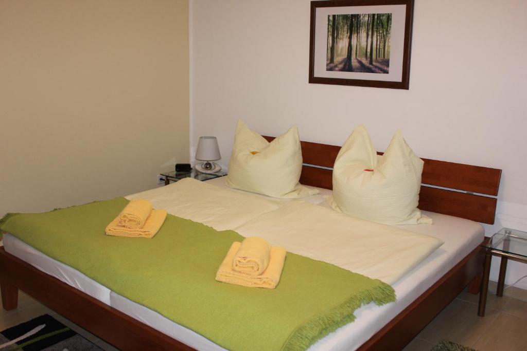 Postel nebo postele na pokoji v ubytování Weber Apartments