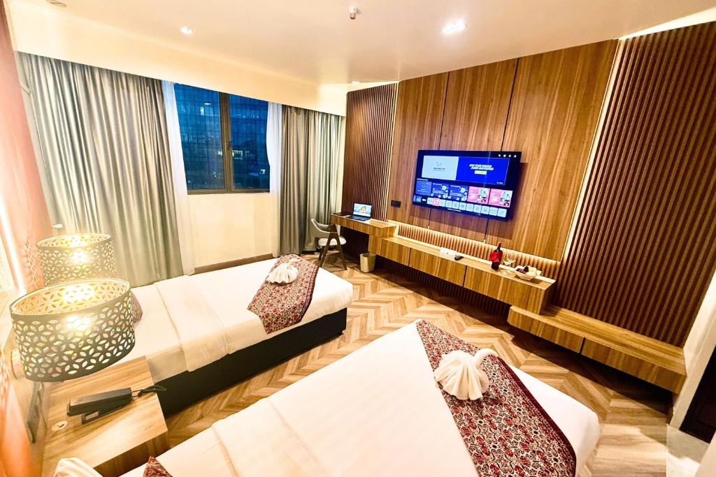 TV a/nebo společenská místnost v ubytování Hotel Shangri-la Kota Kinabalu