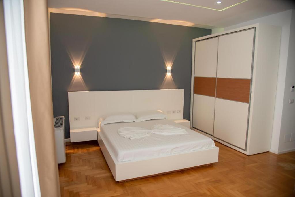 Postel nebo postele na pokoji v ubytování Thea Hotel