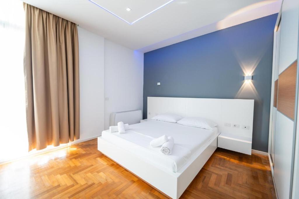 Postel nebo postele na pokoji v ubytování Thea Hotel