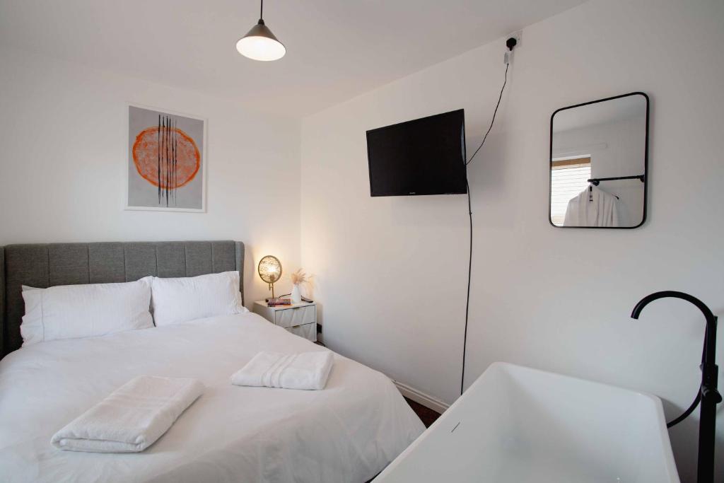 Ένα ή περισσότερα κρεβάτια σε δωμάτιο στο Cosy House In Barnard Castle