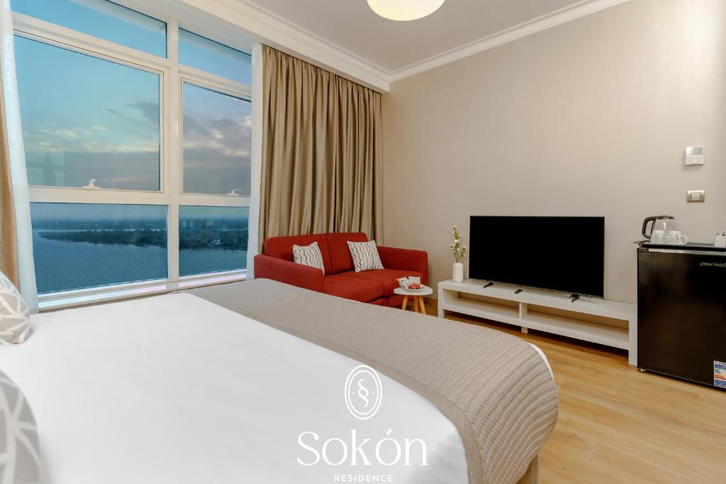 TV a/nebo společenská místnost v ubytování Sokon Residence Nile view at Maadi