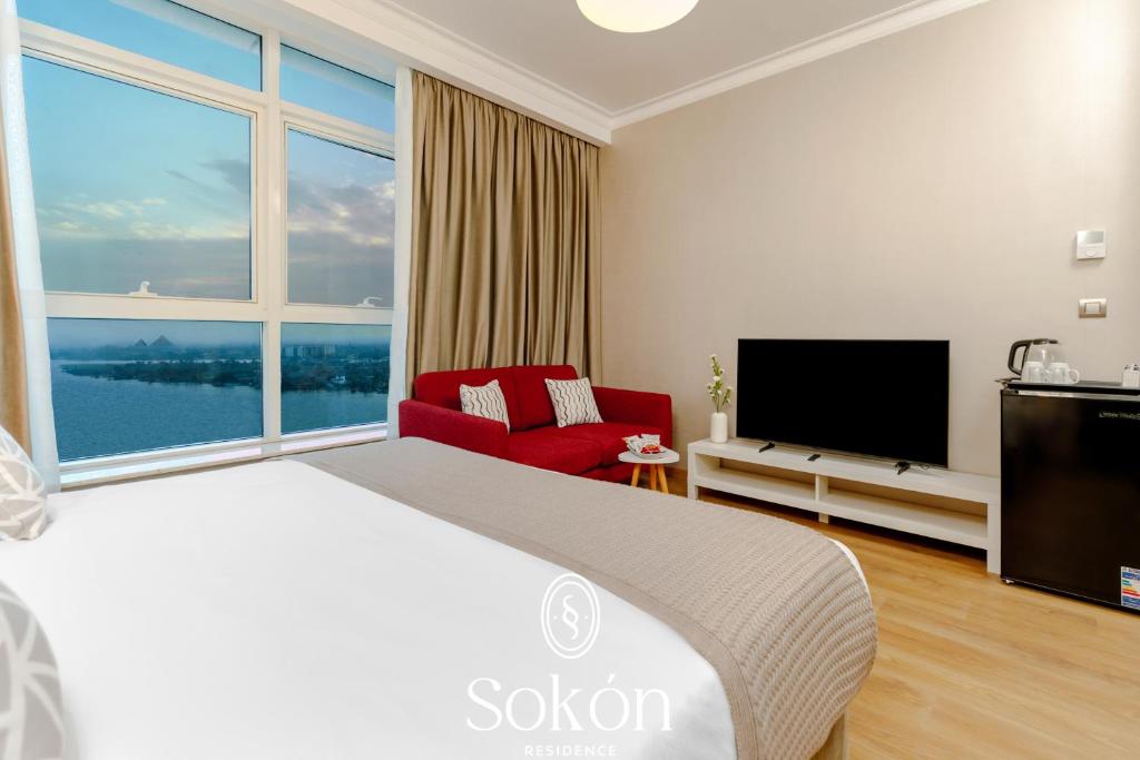 TV a/nebo společenská místnost v ubytování Sokon Residence Nile view at Maadi