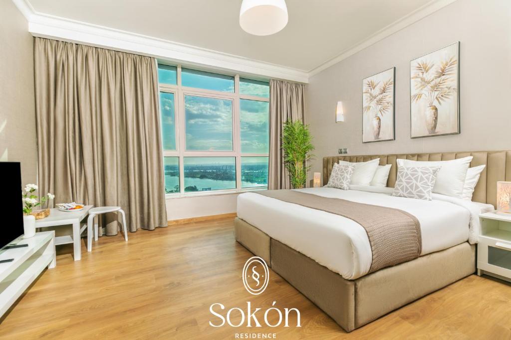 Postel nebo postele na pokoji v ubytování Sokon Residence Nile view at Maadi