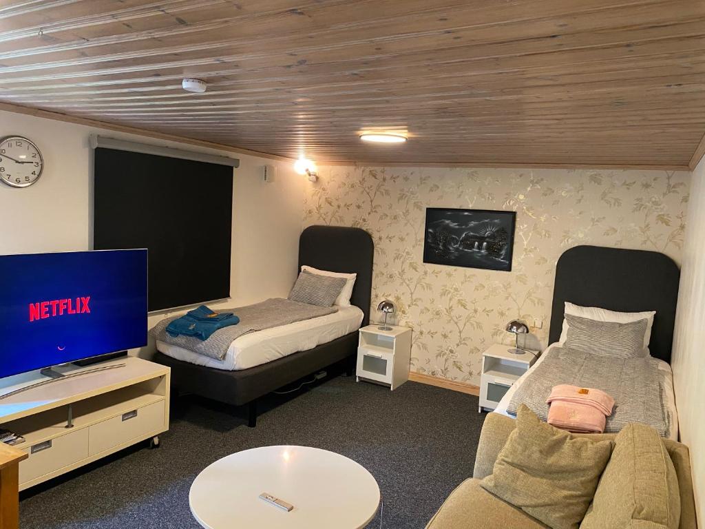 TV a/nebo společenská místnost v ubytování Karlskrona