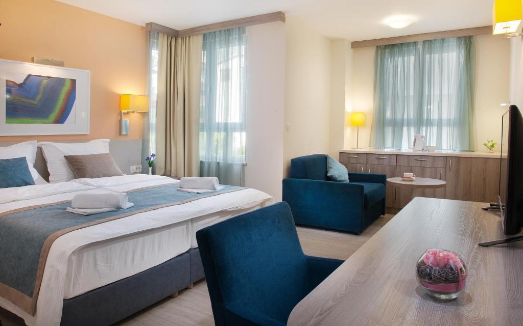 Postel nebo postele na pokoji v ubytování Guesthouse Aroma