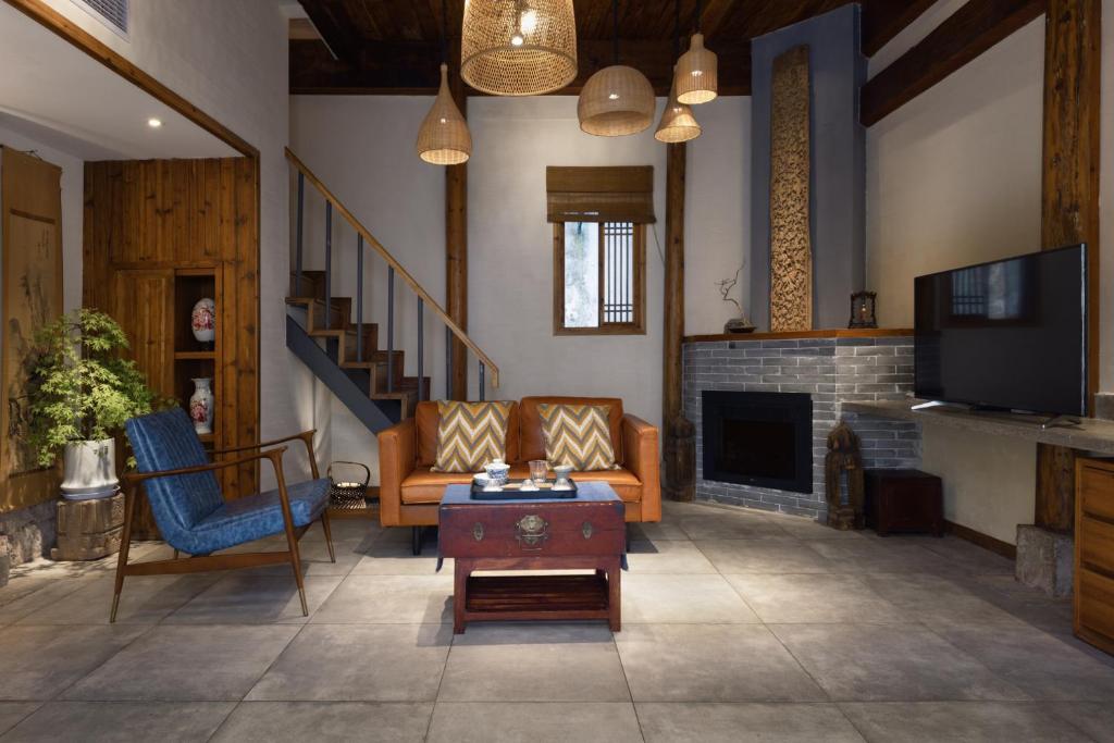 Posezení v ubytování Hidden Moisture and Return to Simplicity Homestay in Mount Huangshan