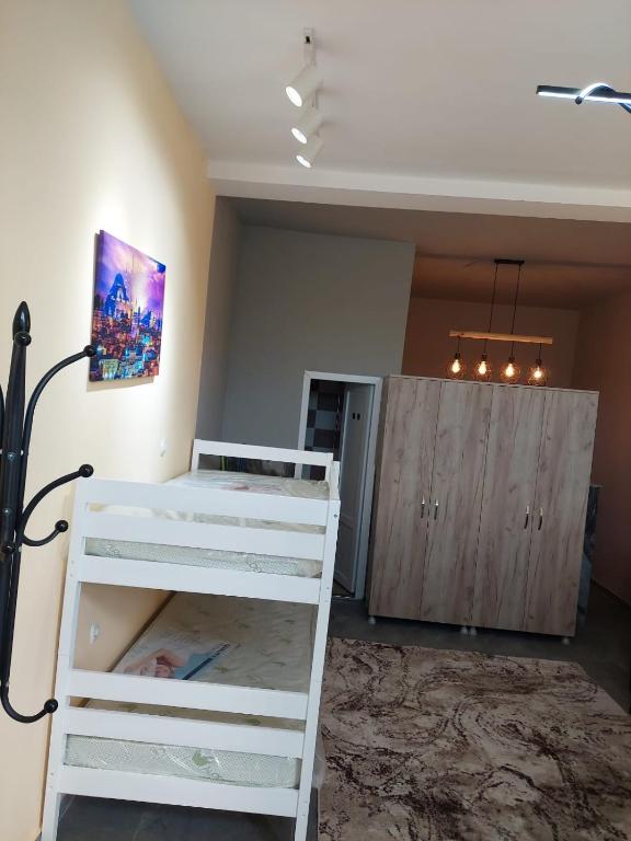 Postel nebo postele na pokoji v ubytování Guesthouse Prizreni