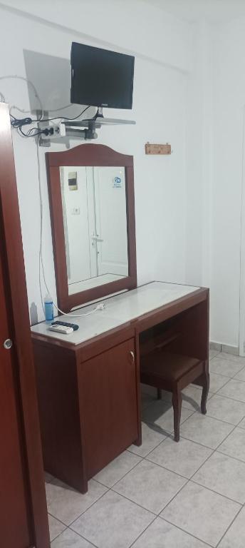 TV a/nebo společenská místnost v ubytování Amari