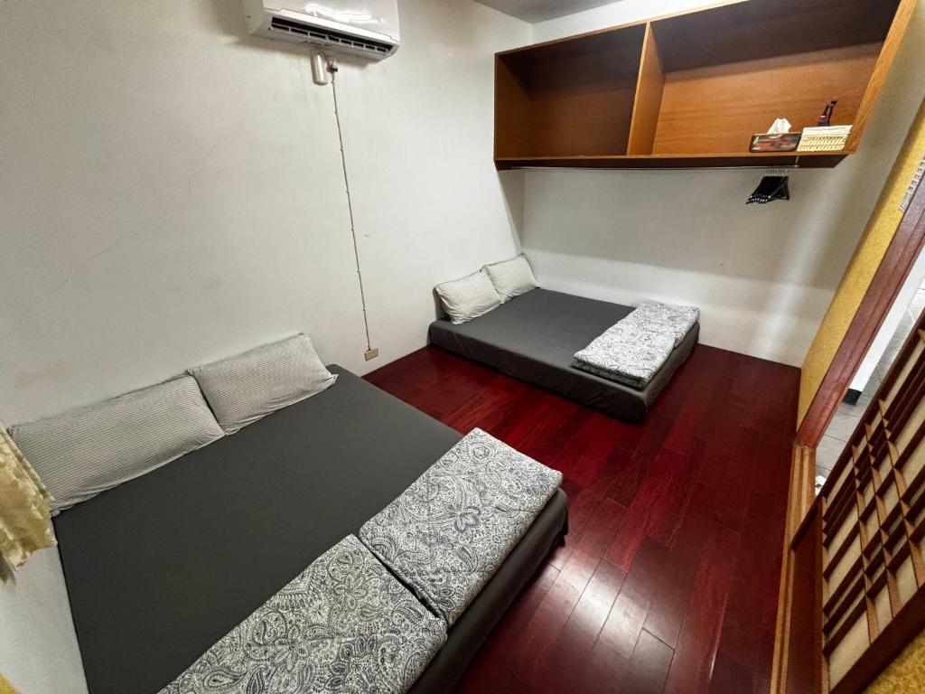 Voodi või voodid majutusasutuse Lanyu Yishanan B&B toas