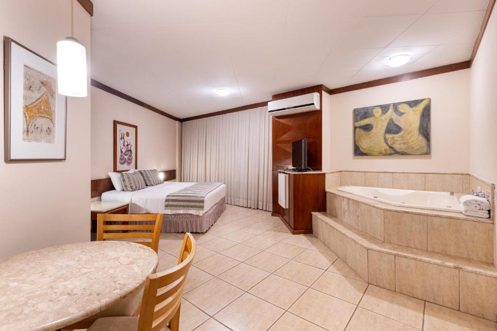 Postel nebo postele na pokoji v ubytování Hotel Crystal