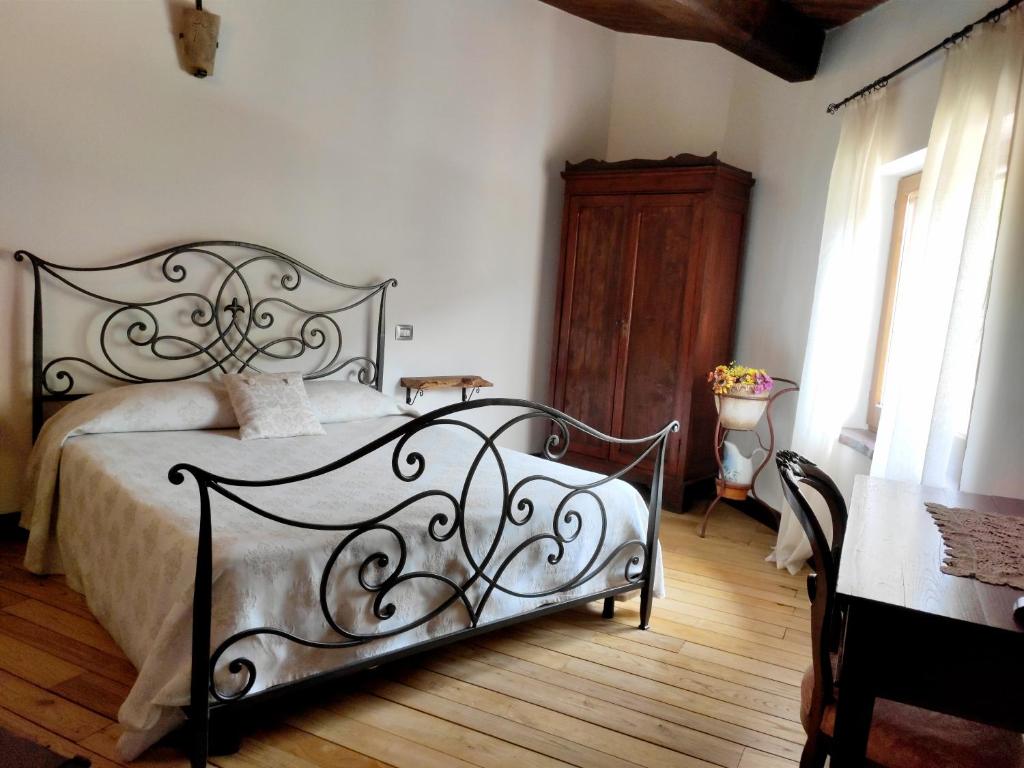 Postel nebo postele na pokoji v ubytování B&B I Martelli