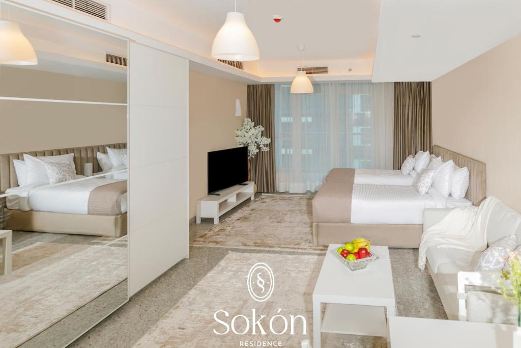 TV a/nebo společenská místnost v ubytování Sokon Residence Nile view at Maadi