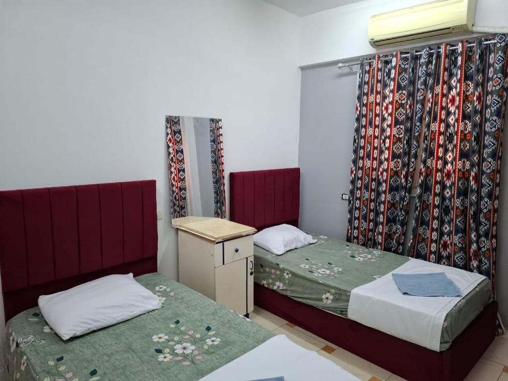Postel nebo postele na pokoji v ubytování david hostel