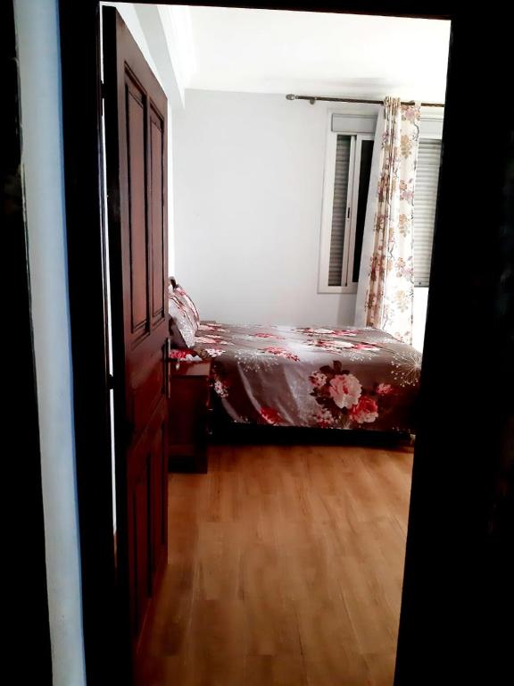 Postel nebo postele na pokoji v ubytování Dar yahya