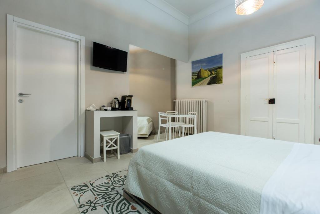 Postel nebo postele na pokoji v ubytování Matera In Vacanza