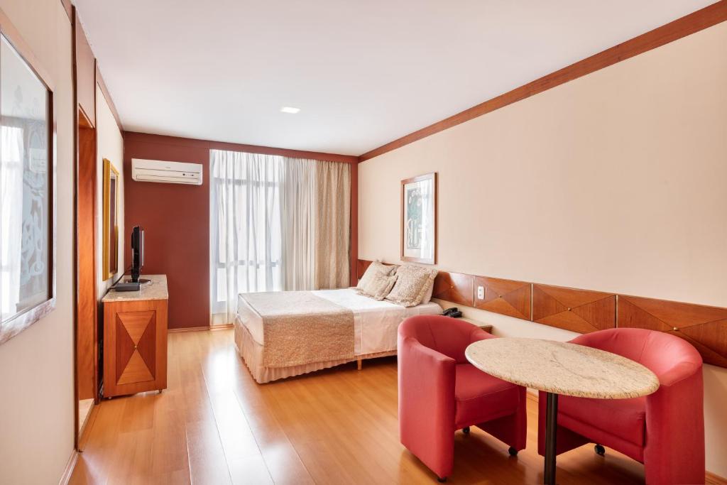 Postel nebo postele na pokoji v ubytování Hotel Crystal