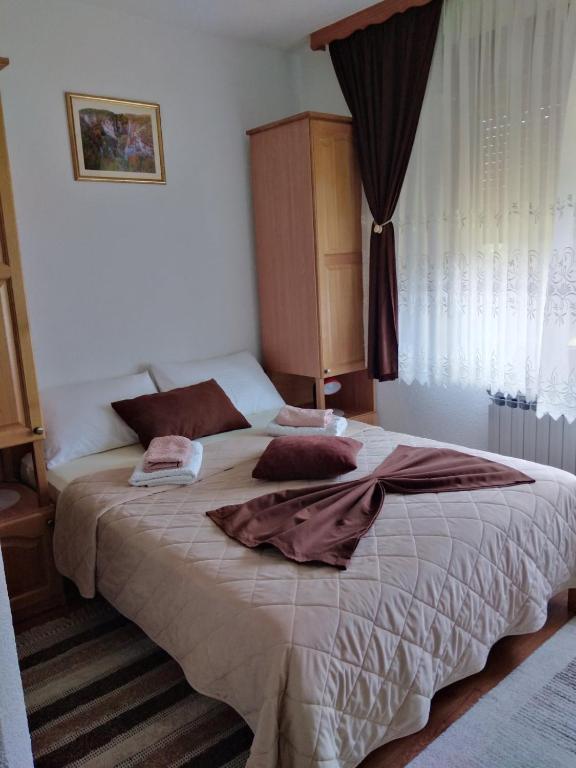 Postel nebo postele na pokoji v ubytování Plitvice House Milan