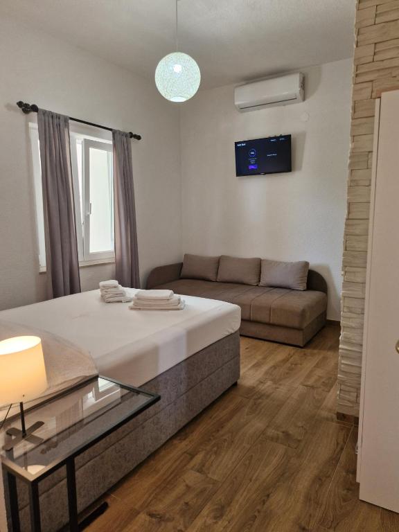 Postel nebo postele na pokoji v ubytování Guest House Keskic