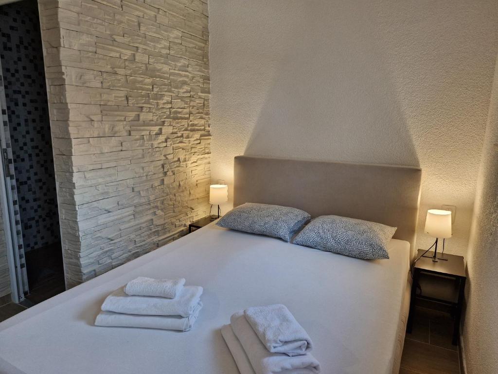 Postel nebo postele na pokoji v ubytování Guest House Keskic