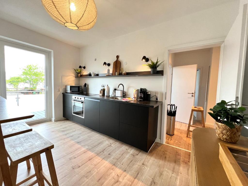 Kuchyň nebo kuchyňský kout v ubytování BRIGHT Elzer Straße