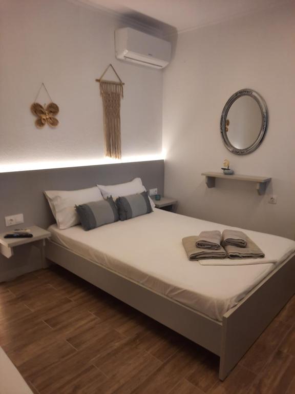 Postel nebo postele na pokoji v ubytování Bungalows anestis