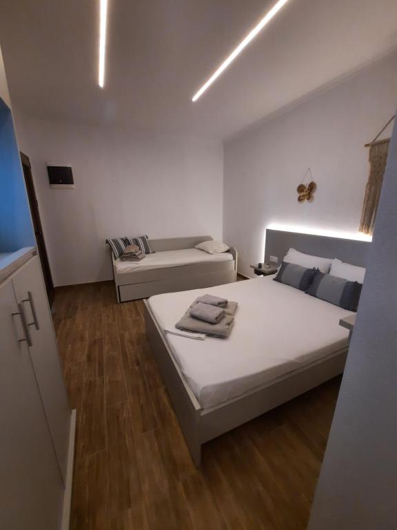 Postel nebo postele na pokoji v ubytování Bungalows anestis