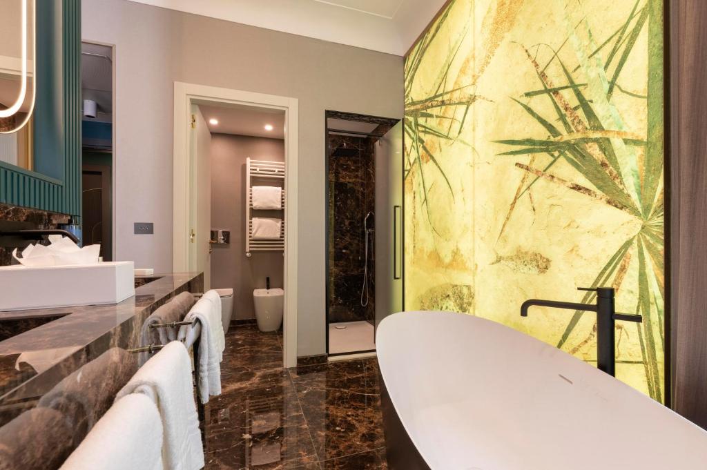 Koupelna v ubytování Je Rome Hotel