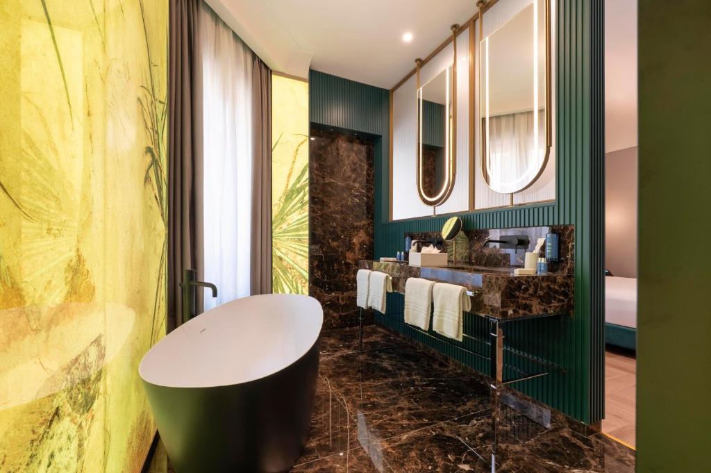 Posezení v ubytování Je Rome Hotel