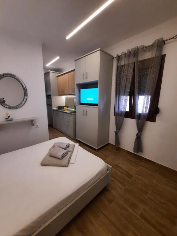 Postel nebo postele na pokoji v ubytování Bungalows anestis