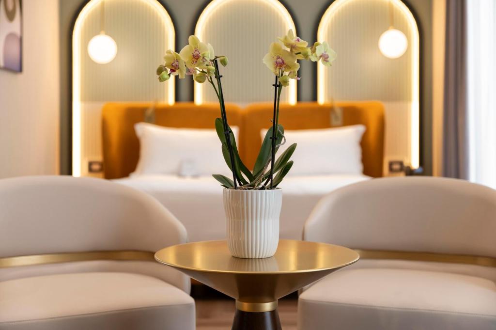 Posezení v ubytování Je Rome Hotel