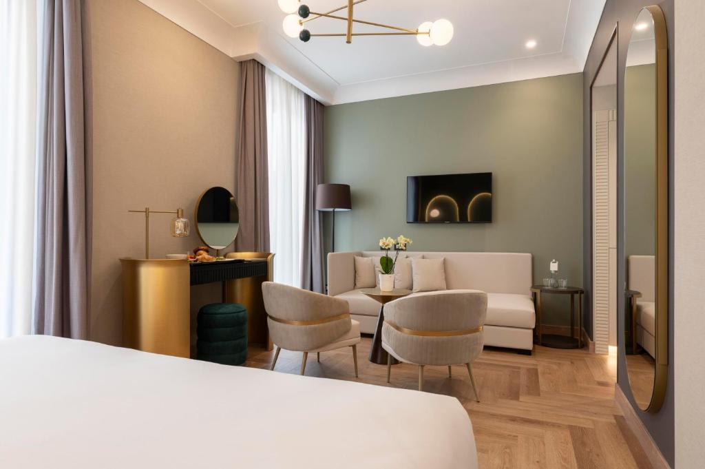 Posezení v ubytování Je Rome Hotel