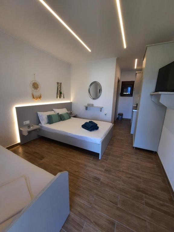 Postel nebo postele na pokoji v ubytování Bungalows anestis