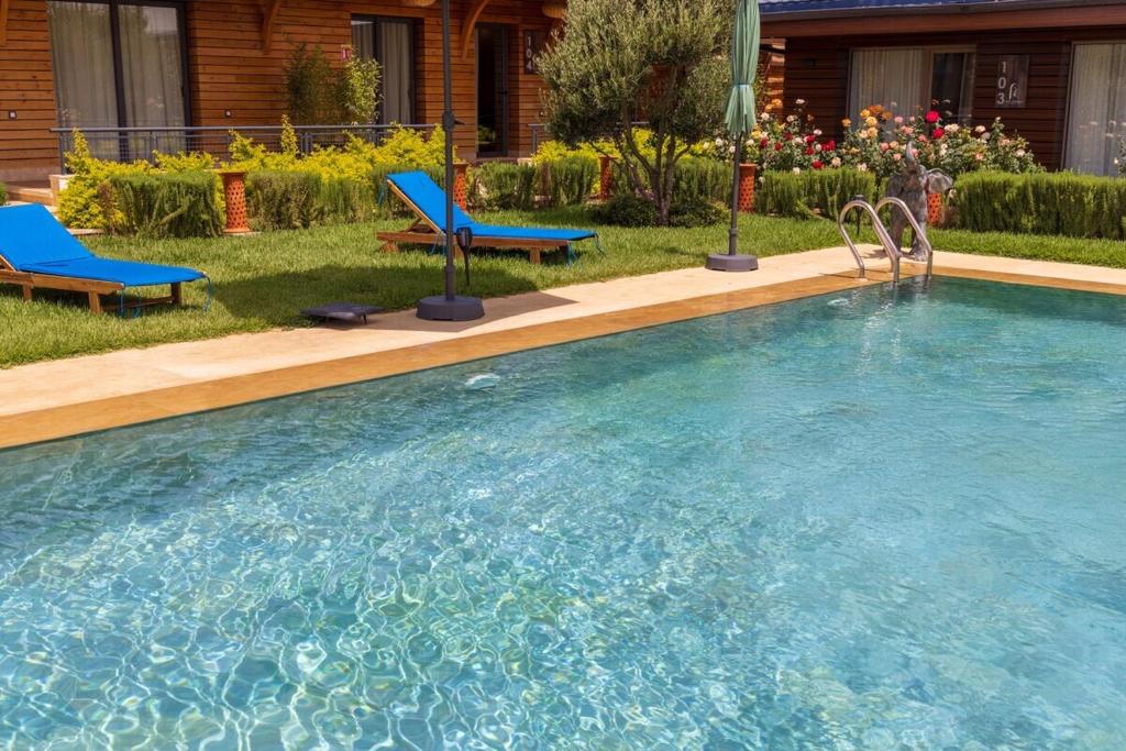 Bazén v ubytování Dar Zarrouk - Eco Lodge Briech Assilah nebo v jeho okolí