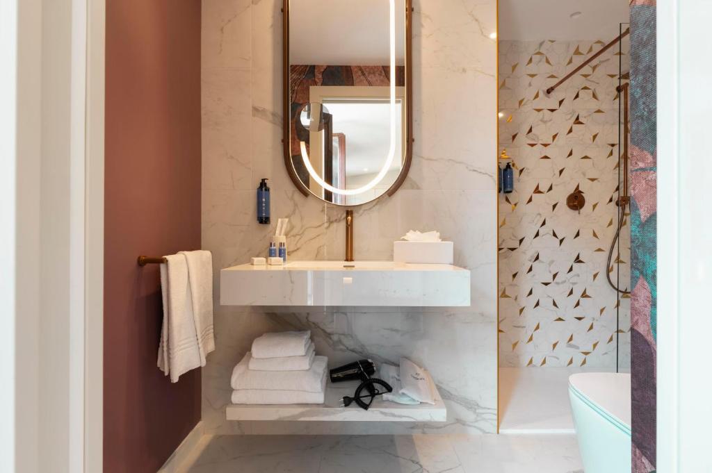Koupelna v ubytování Je Rome Hotel