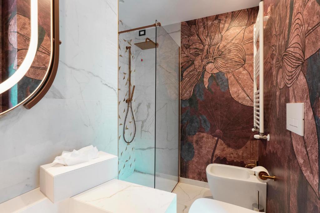 Koupelna v ubytování Je Rome Hotel