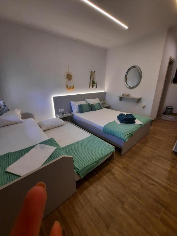 Postel nebo postele na pokoji v ubytování Bungalows anestis