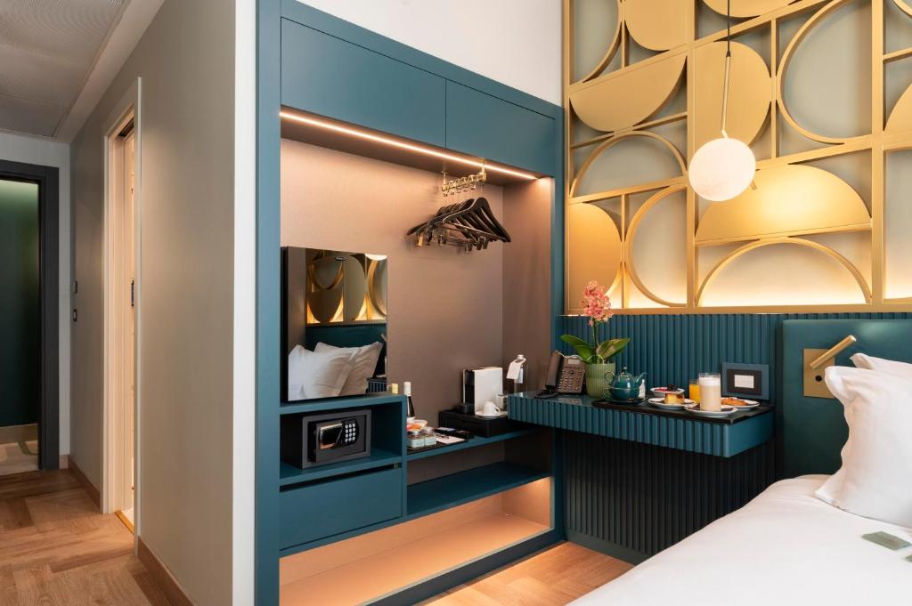 Postel nebo postele na pokoji v ubytování Je Rome Hotel